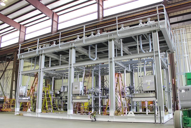 Gas conditioning unit in modular skid package by Power Service, a DNOW company, at the DNOW U.S. Process Solutions facility. Gas conditioning unit in modular skid package by Power Service, a DNOW company, at the DNOW U.S. Process Solutions facility.